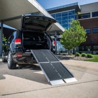 Suitcase portable wheelchair accessibility ramp